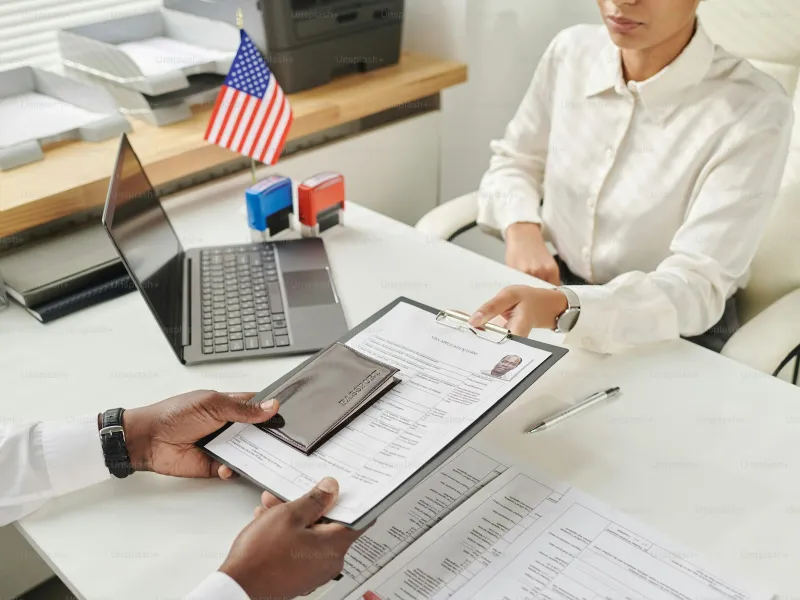 Traveler presenting passport at immigration desk for Costa Rica entry