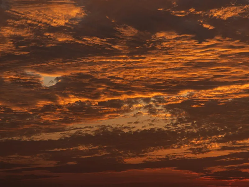Dramatic orange sunset over the Costa Rica Pacific coast in dry season
